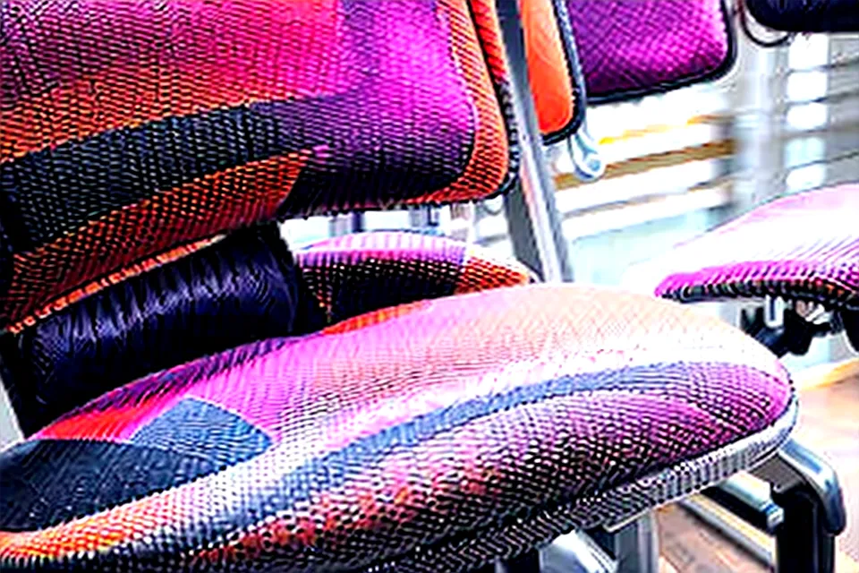 Close-up of Steelcase Amia fabric and seat adjustment controls
