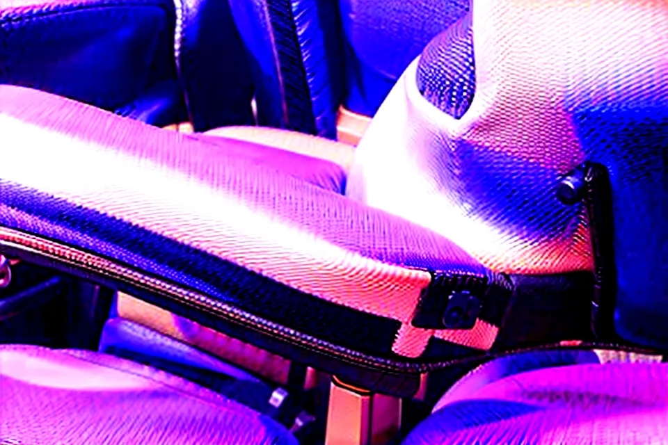 Close-up of the 4D adjustable armrests on a Steelcase office chair